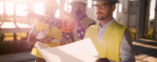 Picture of male construction engineer working on building site